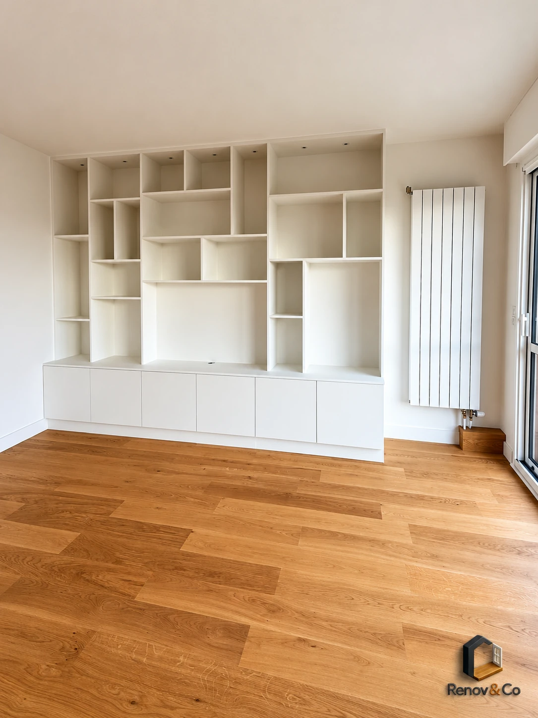 Bibliothèque sur mesure et parquet réalisés par RENOV & CO